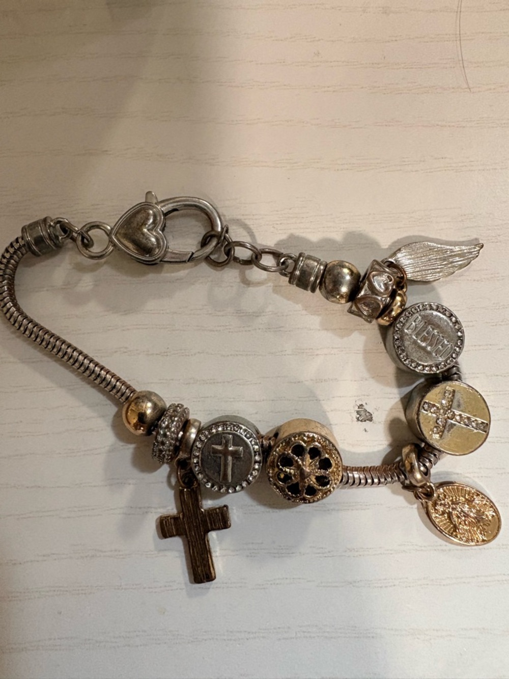 Pandora Two-Tone Silver and Gold Charm Bracelet with Cross and Wing Charms